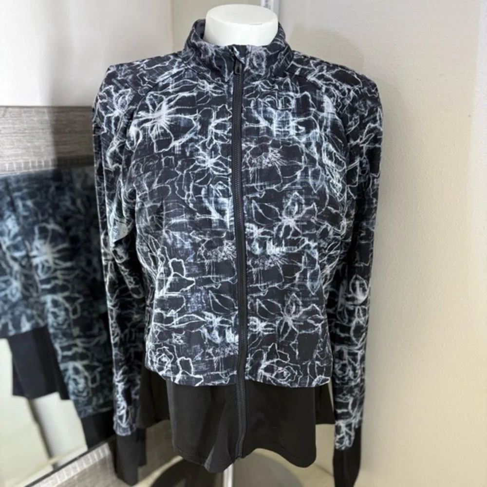 Spyder Black and White Running Jacket with layered Athletic Silhouette